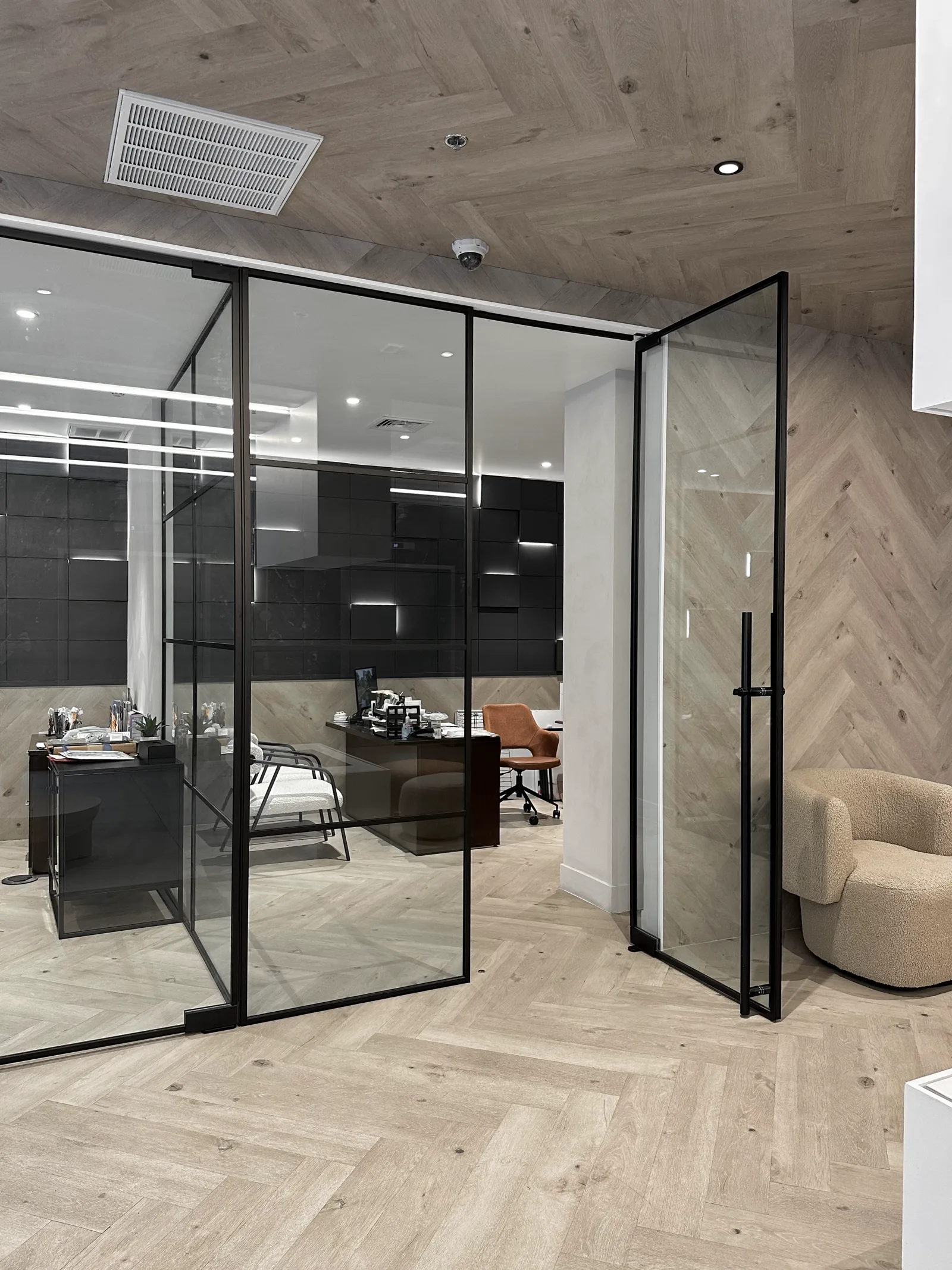 Private office glass partition with 48-inch bar pull handle by WiseGlass NY