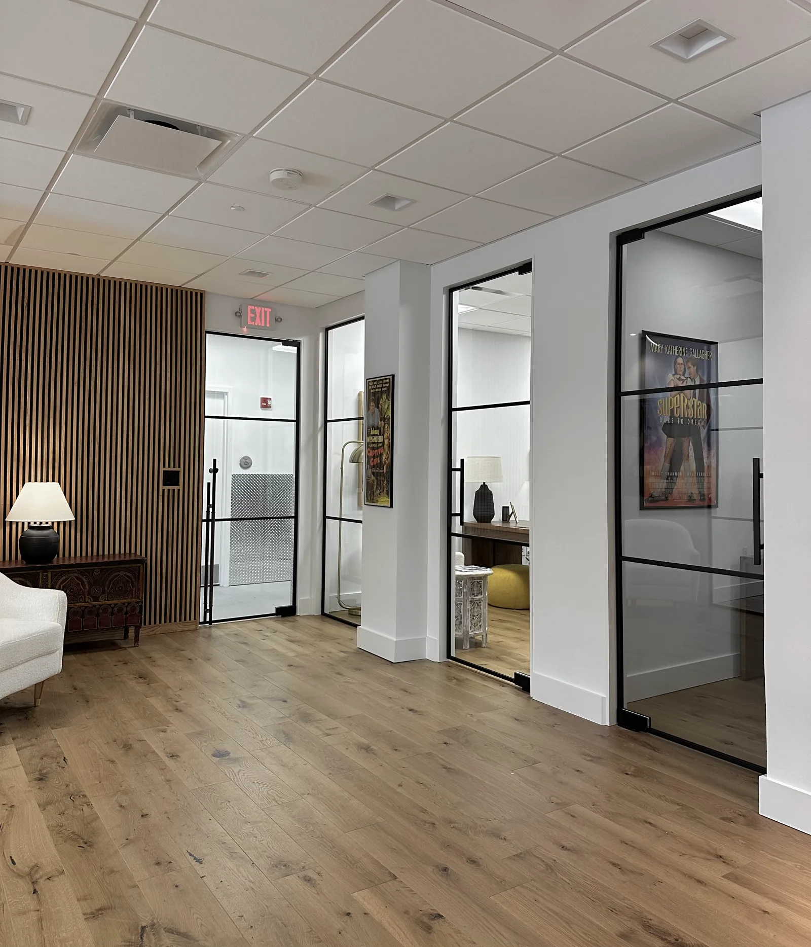 Executive office suite with multiple swinging glass doors by WiseGlass NY