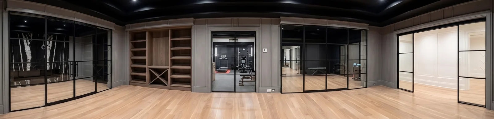 360° panorama — multiple black matte powder-coated double swinging and double sliding glass partitions throughout Saddle River NJ estate by WiseGlass NY