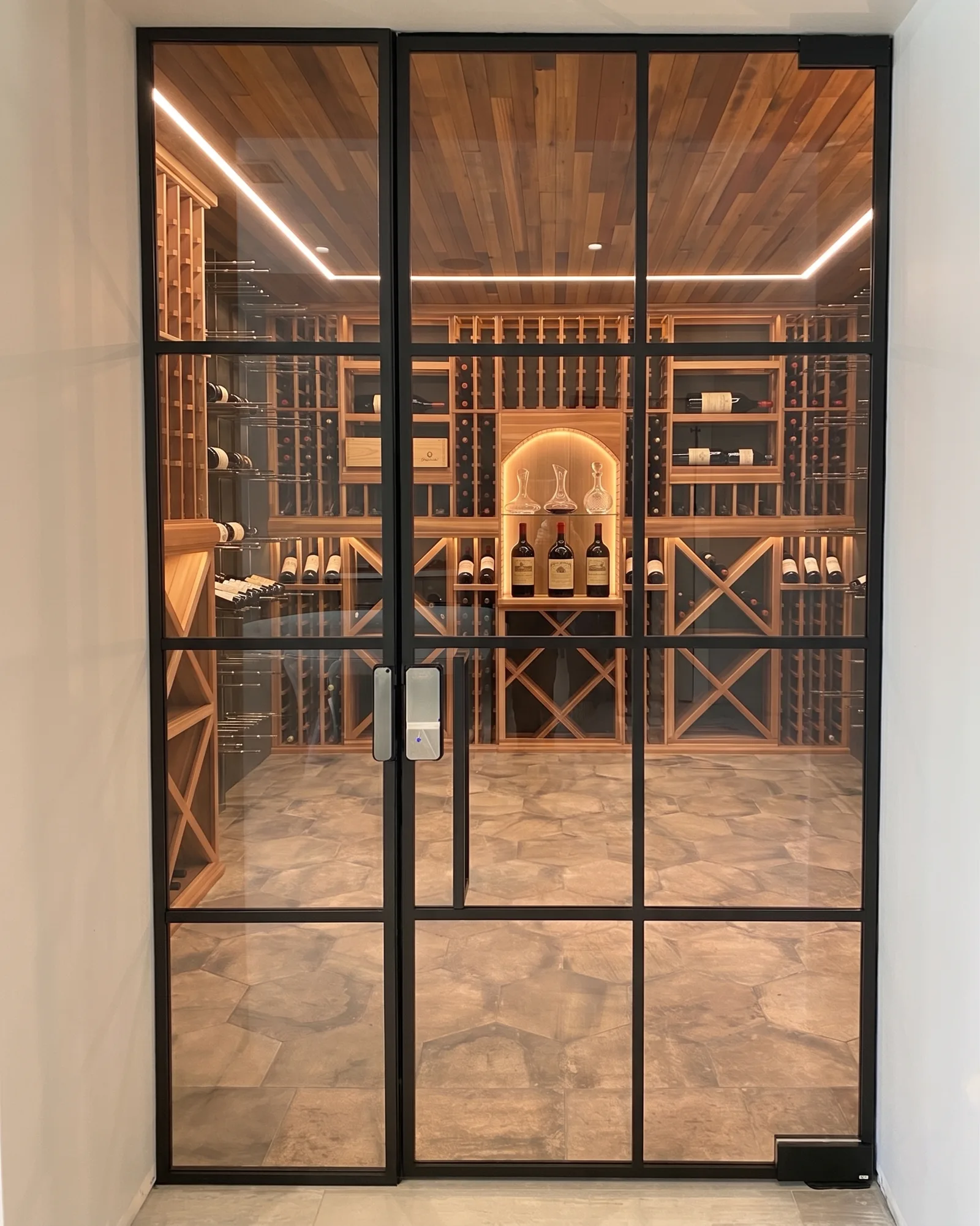Custom glass wine cellar with electronic lock and black matte aluminum frame — WiseGlass NY residential