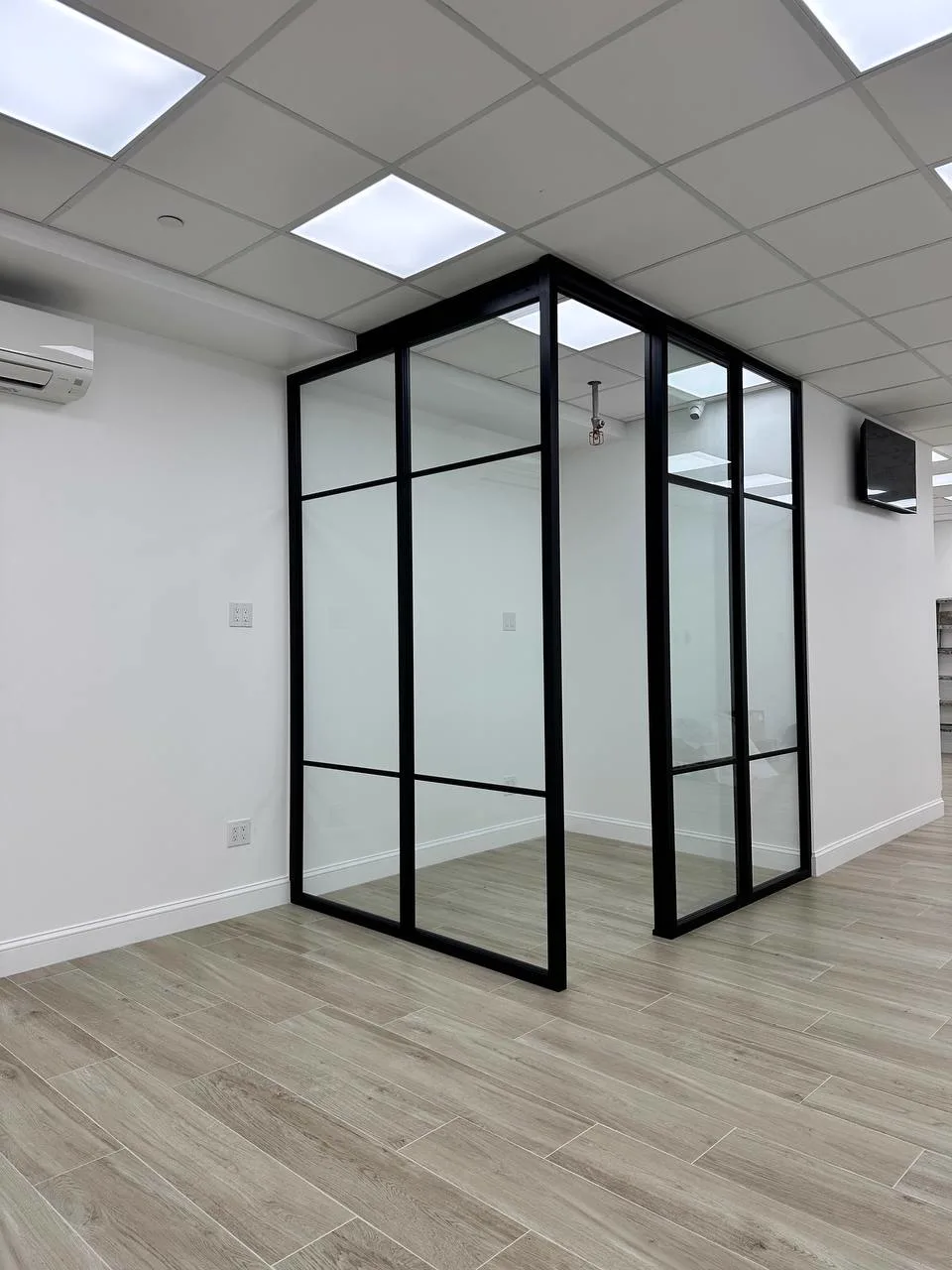 Structural glass frame office enclosure with sliding door, open, by WiseGlass NY