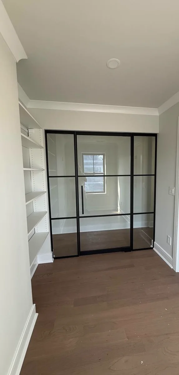 Single swing glass door with fixed sidelights at a home study entrance, New Jersey by WiseGlass NY